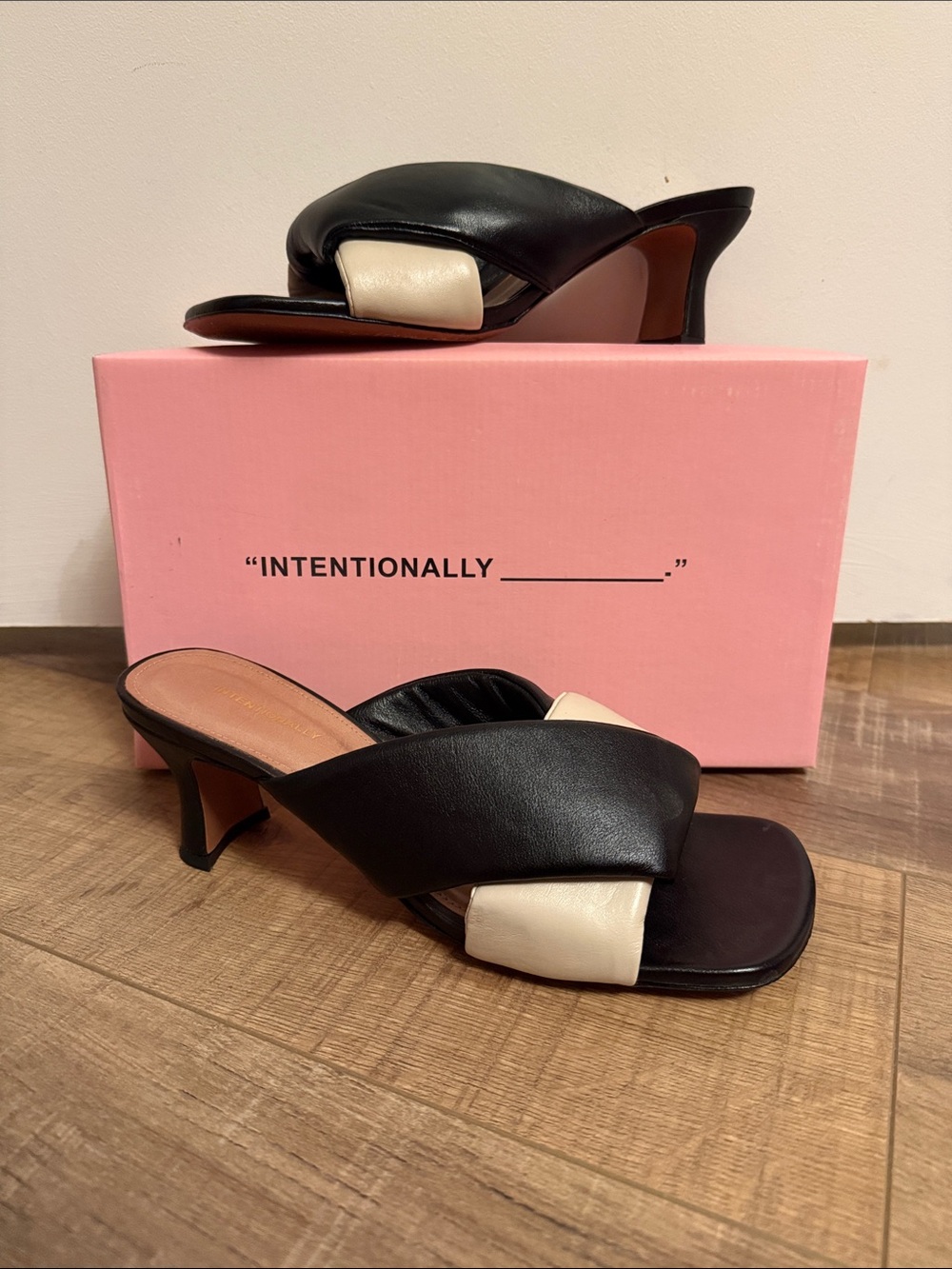 INTENTIONALLY BLANK Black and Cream Cross-Strap Mule Heels